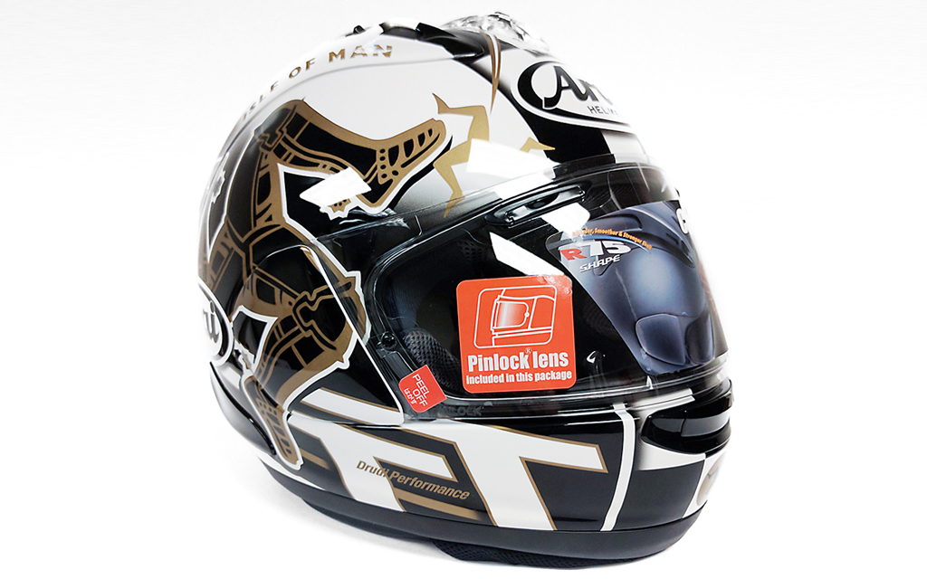 Close-up of Arai Helmet, freshly opened from the box with lens sticker still attached