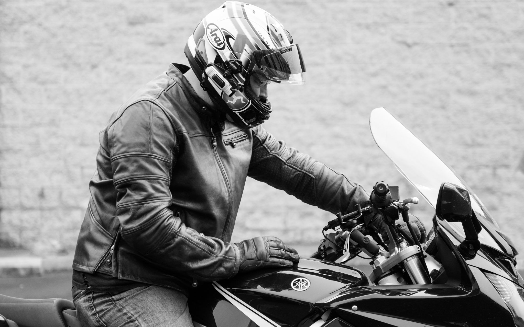 Black and white image of rider on bike