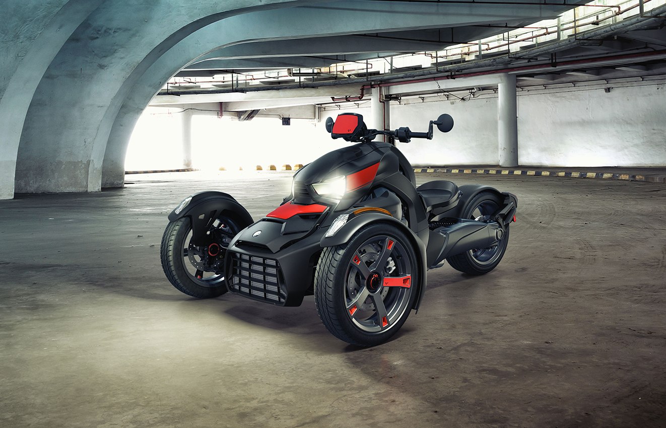 angled shot of red black Can Am Ryker in parking garage