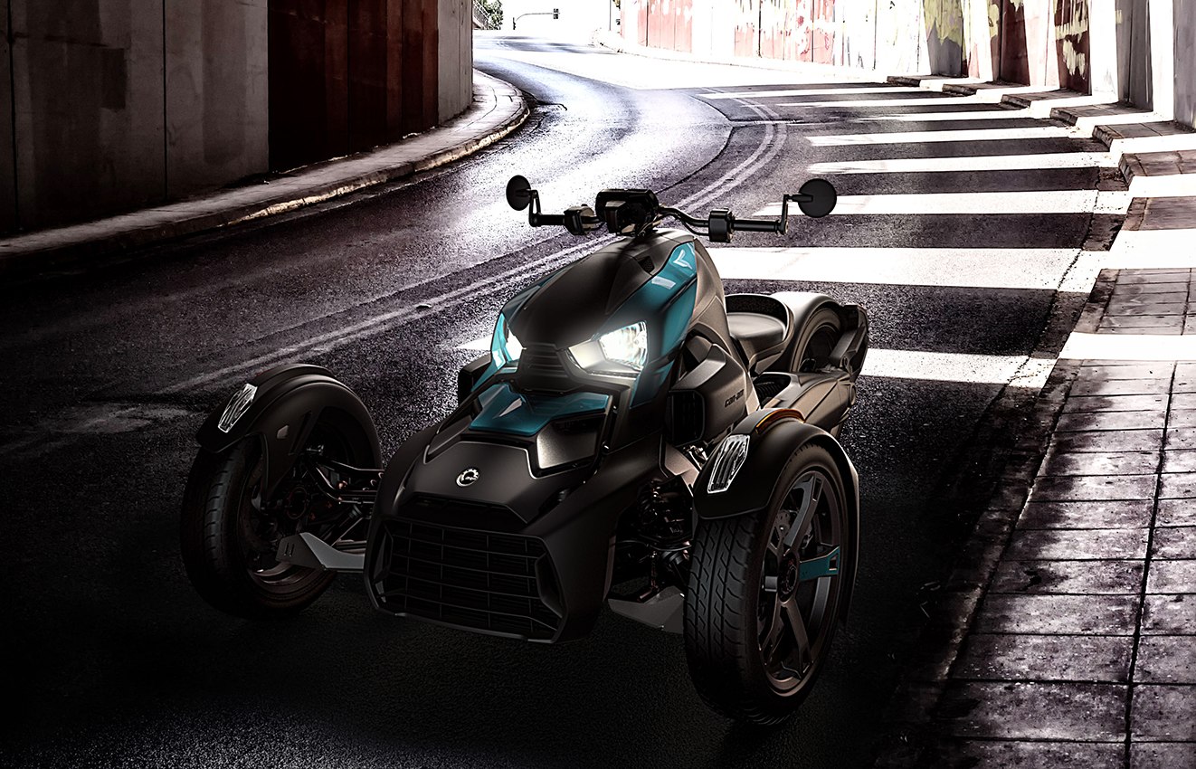 blue black Can Am Ryker parked in shadowed tunnel