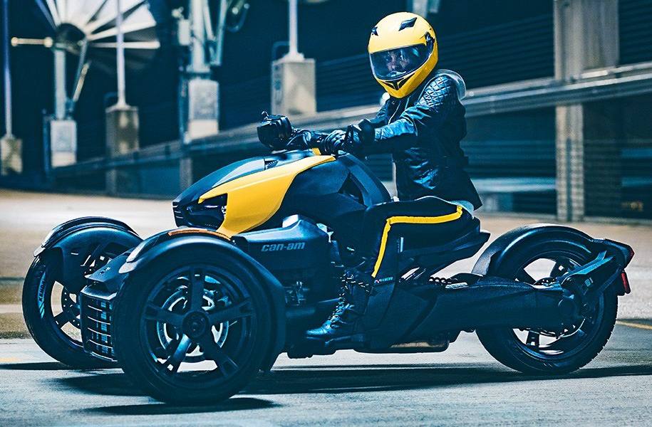 Cool lady riding a Can Am Ryker in the city