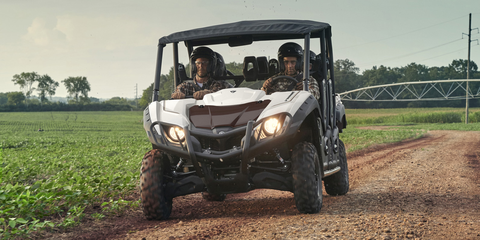 Lifestyle of UTV being driven on farm