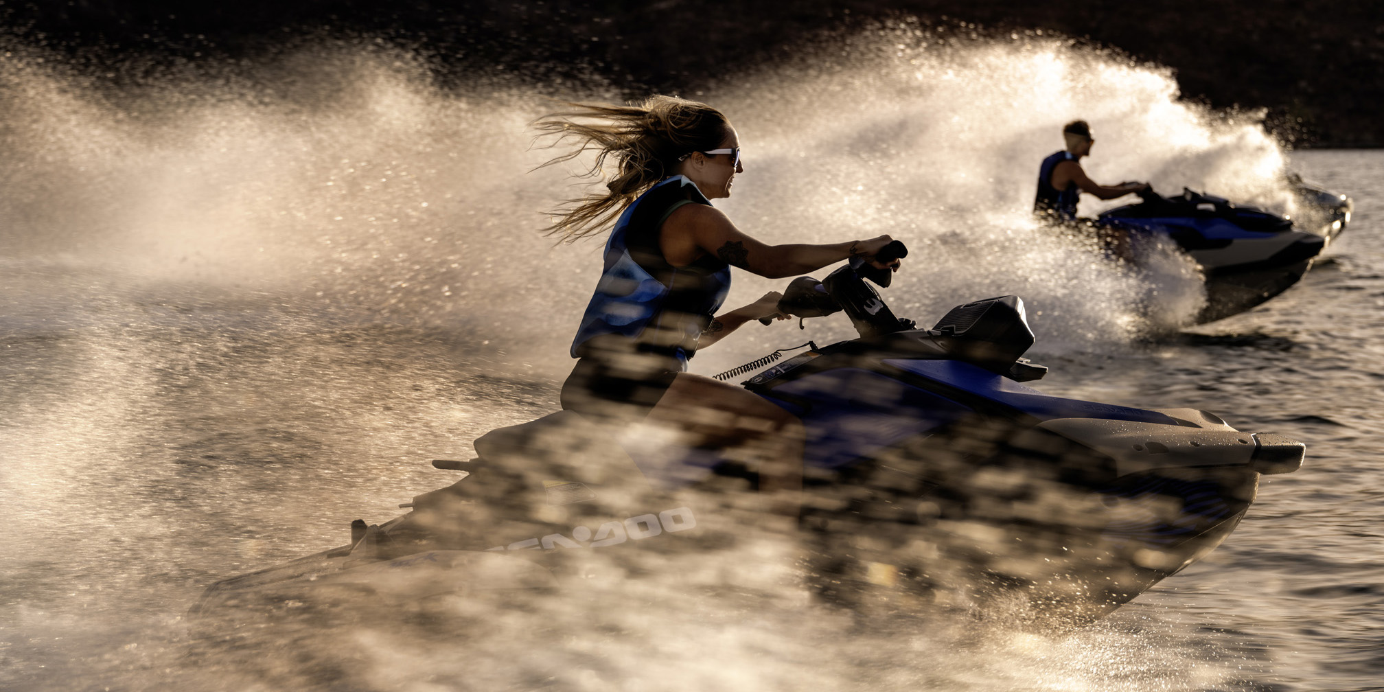 Lifestyle of jet skiers zipping over the water